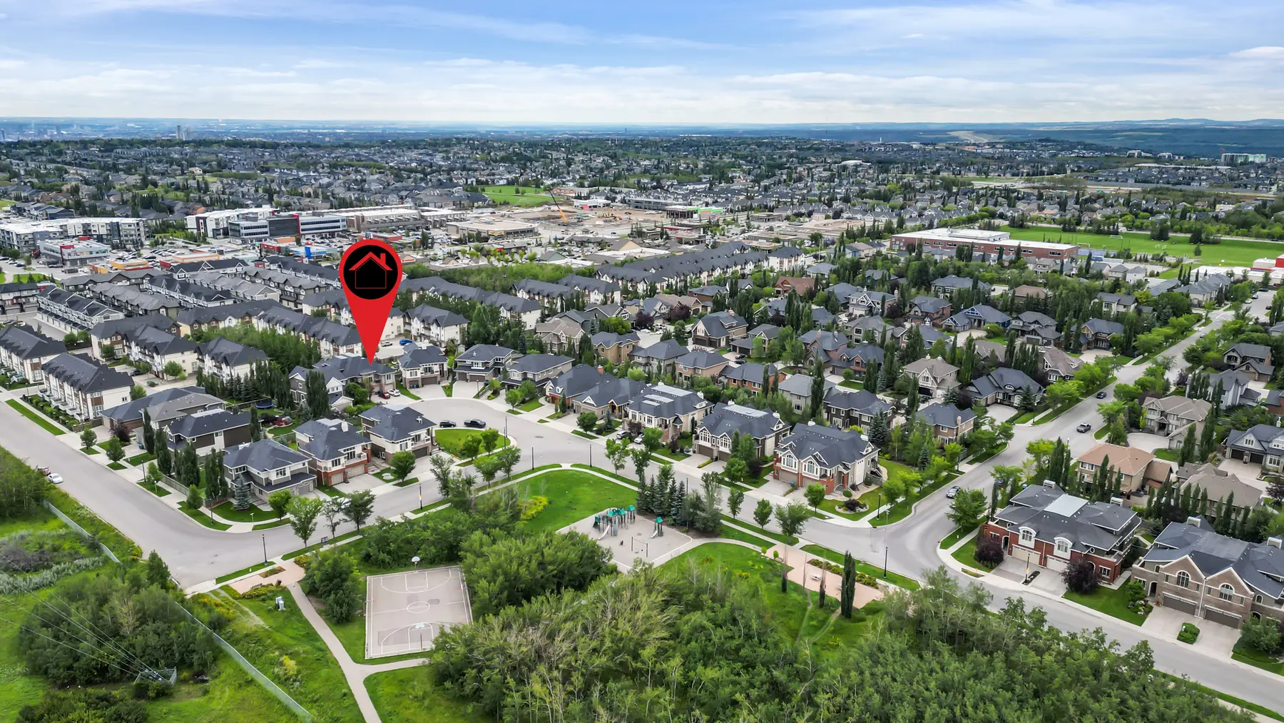 The home’s cul-de-sac marked from above, with the Wentworth Square playground and basketball courts in the park directly below it.